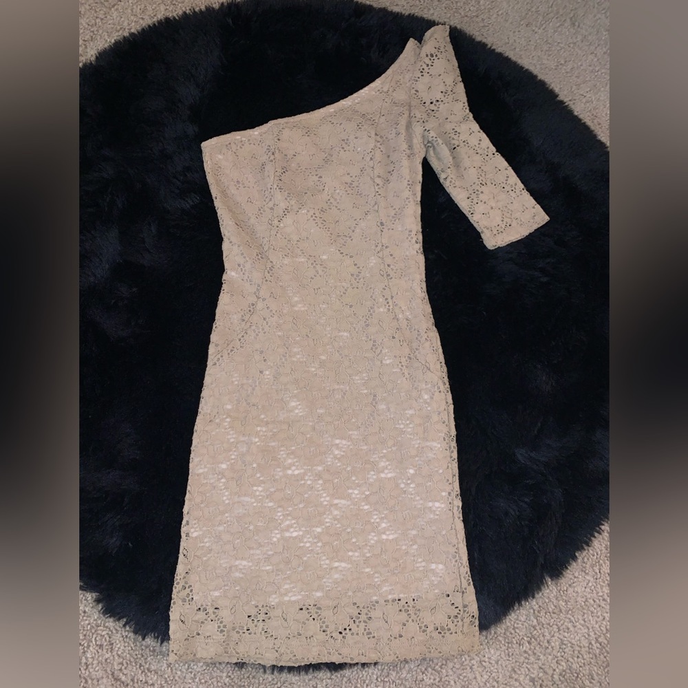 Beige color… above the knee dress.